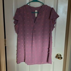 Lilac colored blouse with fun details